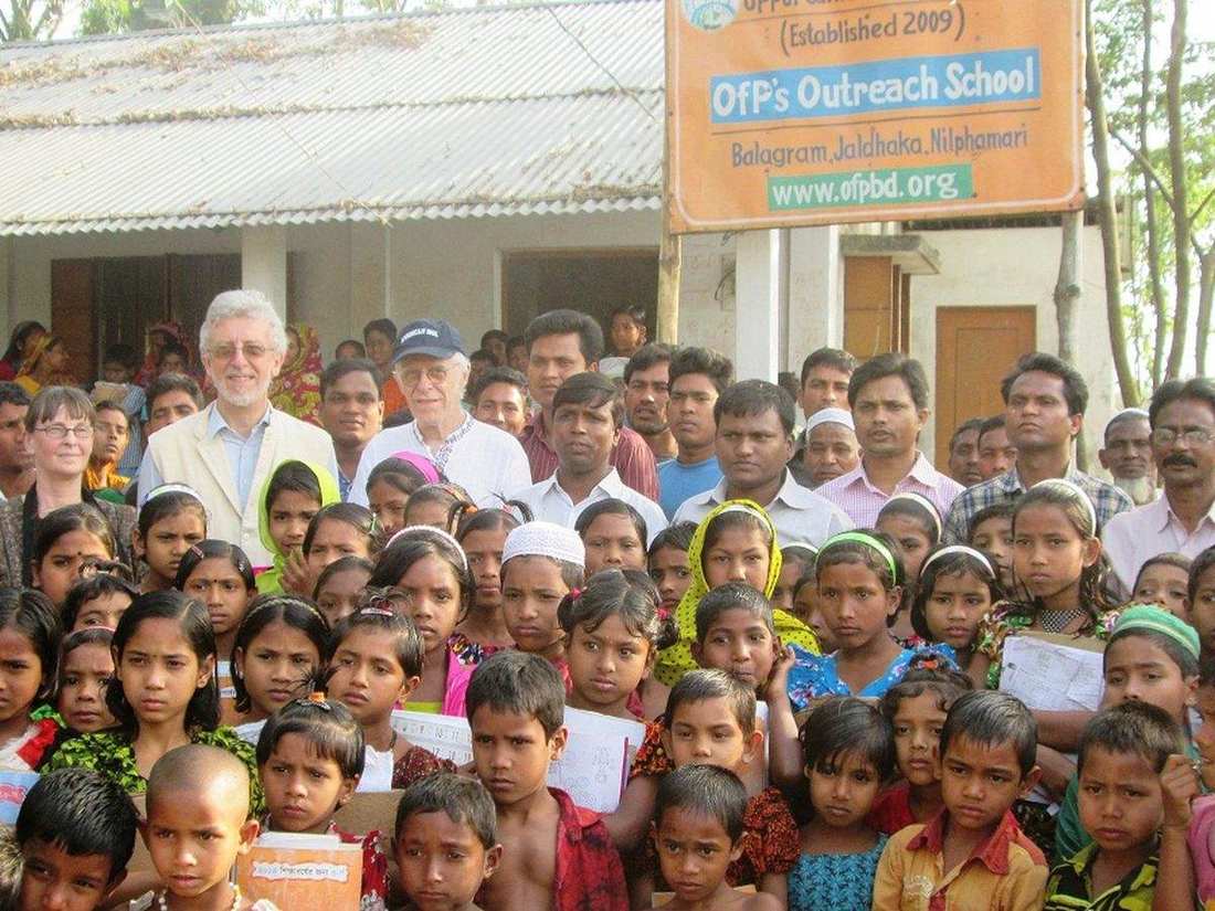 Children and OfP staff outside the OfP outreach school in Balagram, Jaldhaka